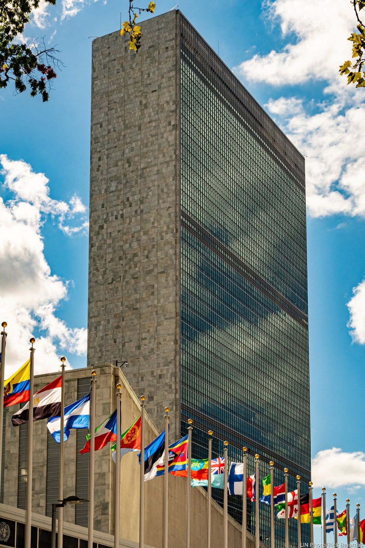 United Nations Headquarters in New York with national flags in the foreground